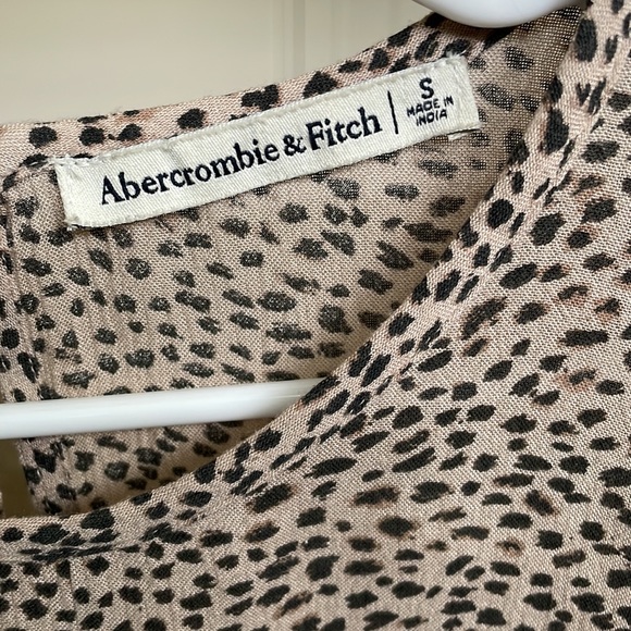 Leopard Peplum Top - Picture 3 of 4